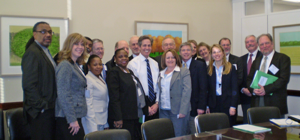 Senator Coleman poses for a group photo in 2008