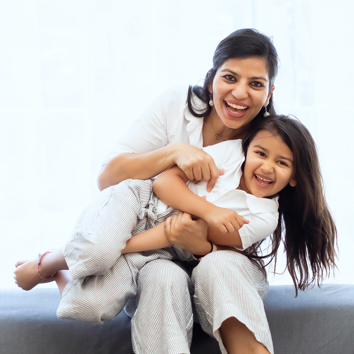 mother and child smiling