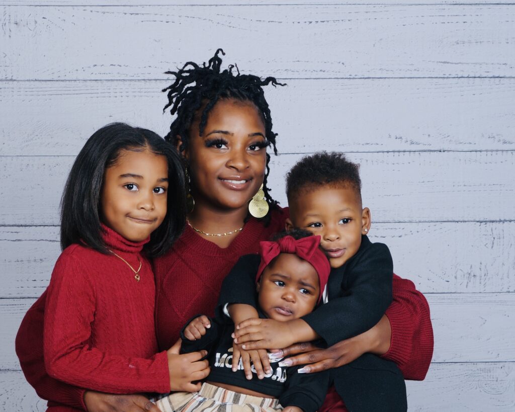 Energy Assistance client, Sheyenne, with her 3 small children