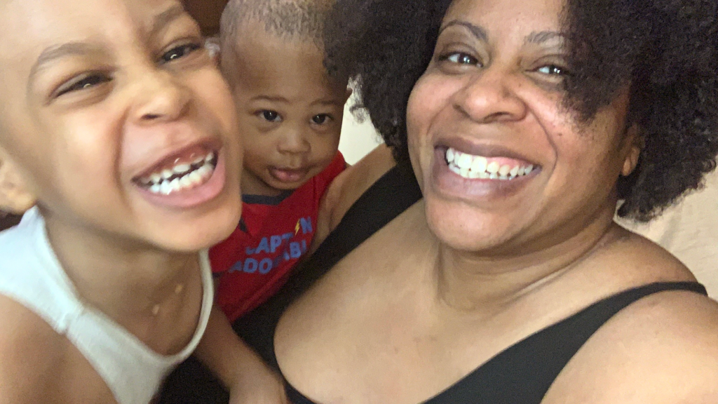 Tray, 2025 Homebuyer Workshop Client, with her two boys