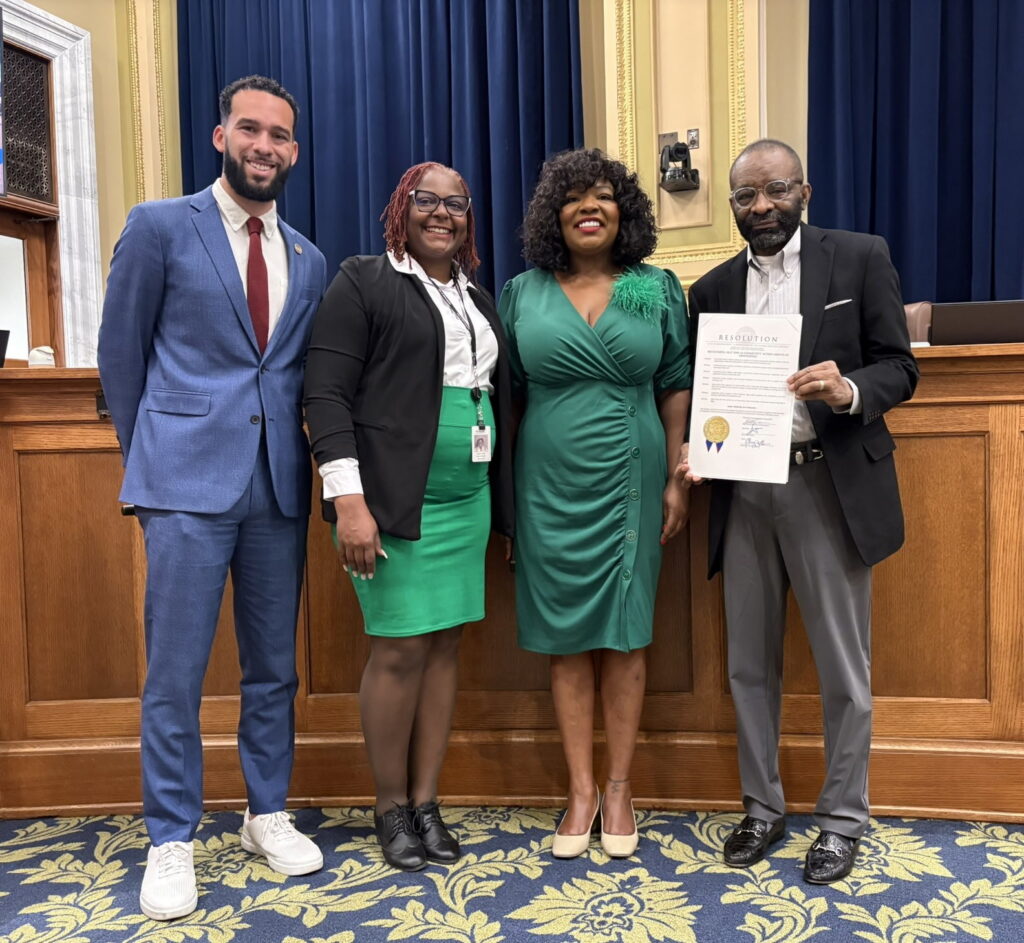 Community Action Month Proclamation presented at Minneapolis City Council meeting on May 7, 2026. Pictured left to right: Minneapolis Council Members Jamison Whiting, Pearll Warren, LaTrisha Vetaw and Dr. Clarence Hightower of Community Action Partnership of Hennepin County.